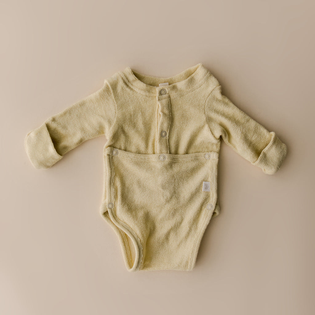 Terry Front flap Onesie | Buttercream